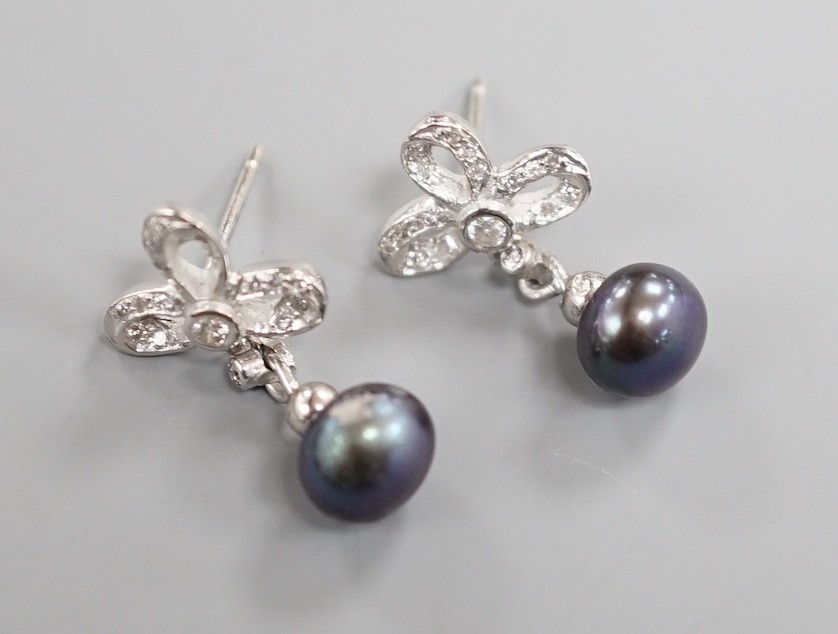 A modern pair of 750 white metal, Tahitian cultured pearl and diamond set drop earrings, 20mm, gross weight 3.8 grams.